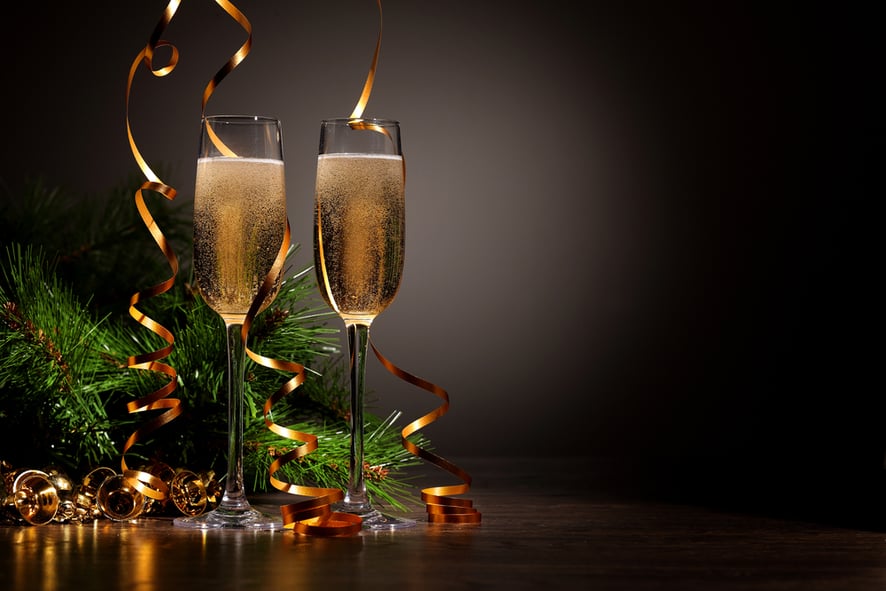 Two champagne glasses ready to bring in the New Year