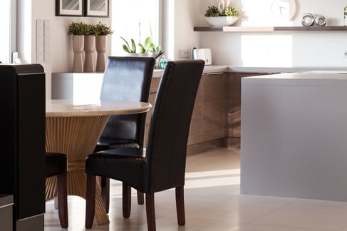 View of dining hall with wooden round table