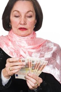 business woman counting Euros